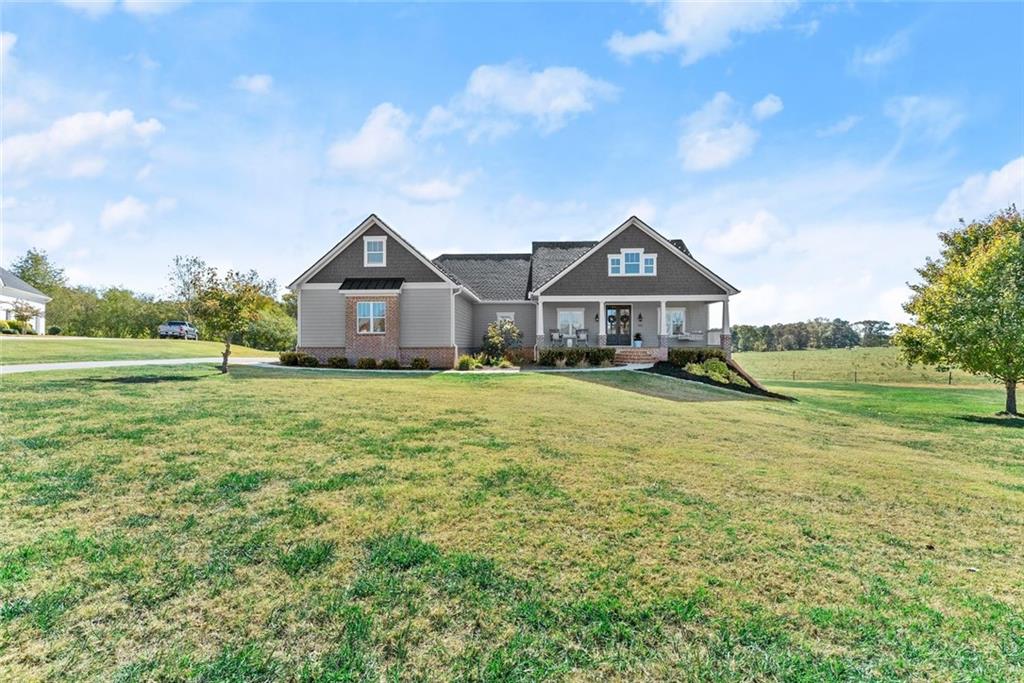 360 Clear View Court Clermont, GA 30527 - Photo 47 of 53 a front view of a house with a yard