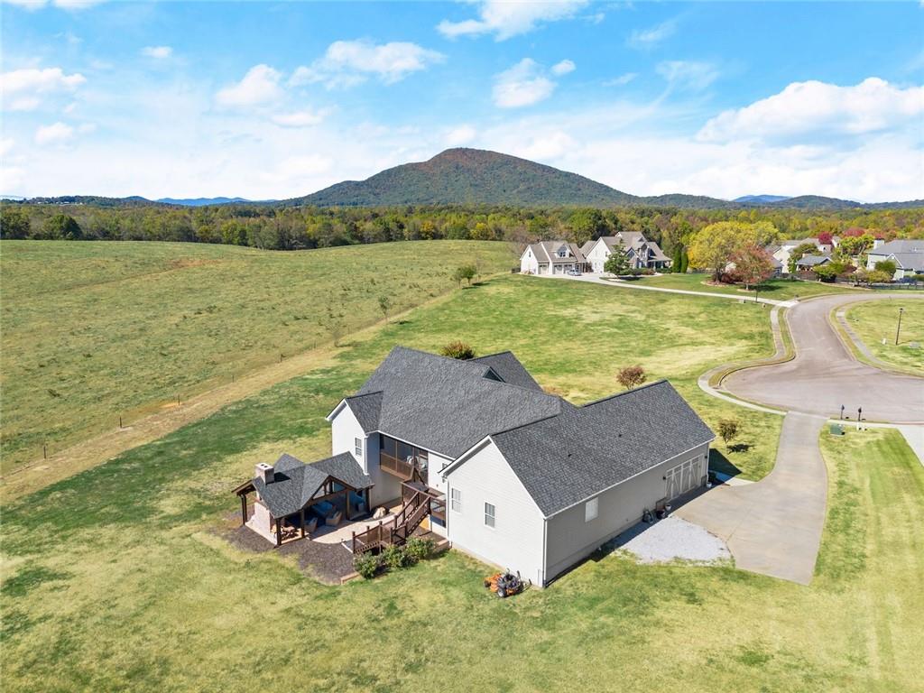 360 Clear View Court Clermont, GA 30527 - Photo 51 of 53 a view of a lake with a mountain in the background
