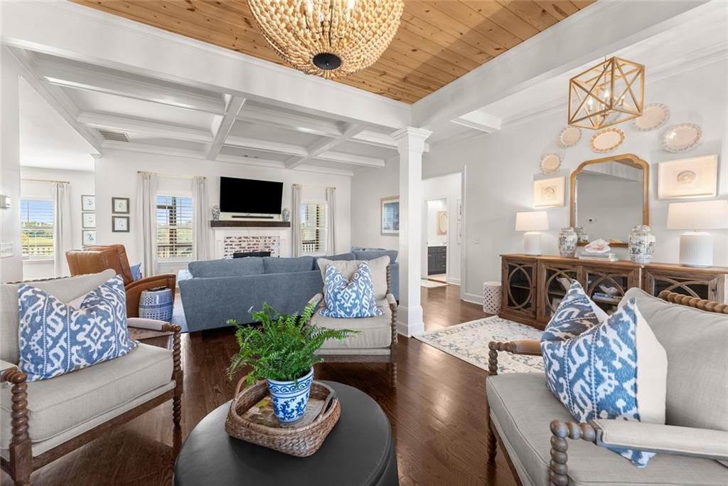 360 Clear View Court Clermont, GA 30527 - Photo 7 of 53 a living room with furniture potted plant and a large window