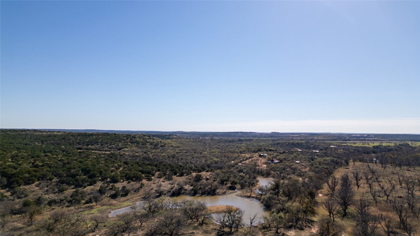 15 County Road 426 Road West Goldthwaite, TX 76844 - Photo 13 of 38 an aerial view of houses covered in trees