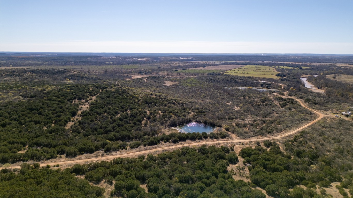 15 County Road 426 Road West Goldthwaite, TX 76844 - Photo 16 of 38 an aerial view of house with yard and mountain in back