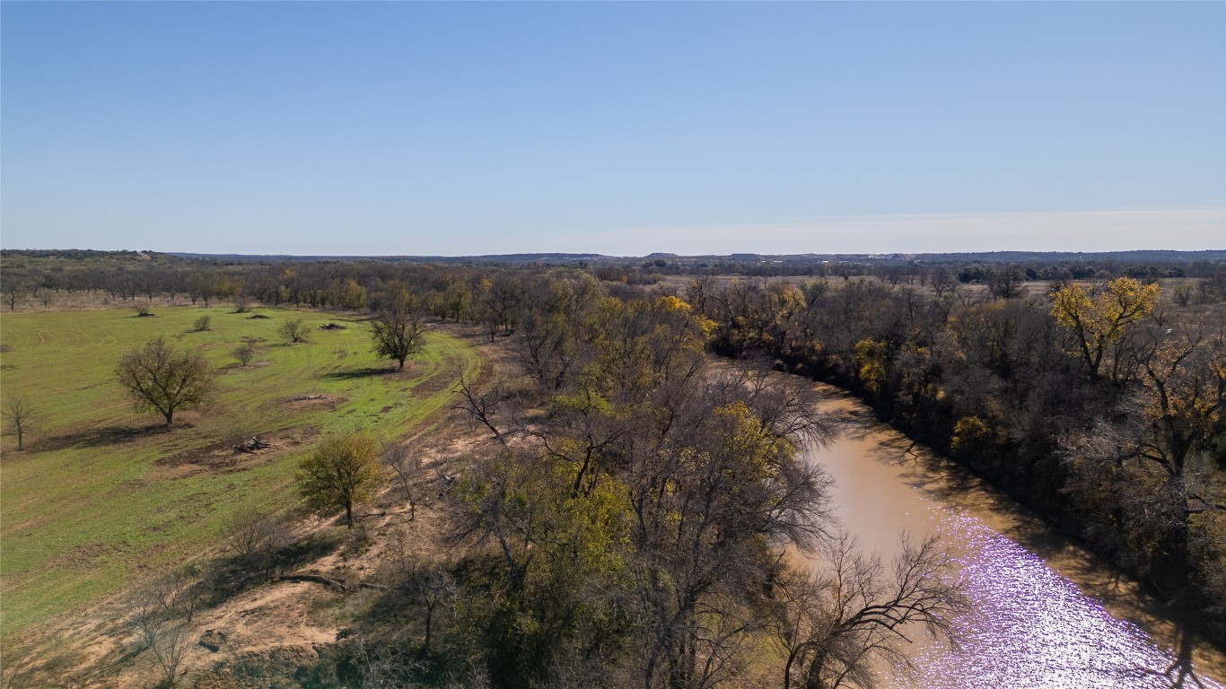 15 County Road 426 Road West Goldthwaite, TX 76844 - Photo 19 of 38 a view of a lake with mountains in the background