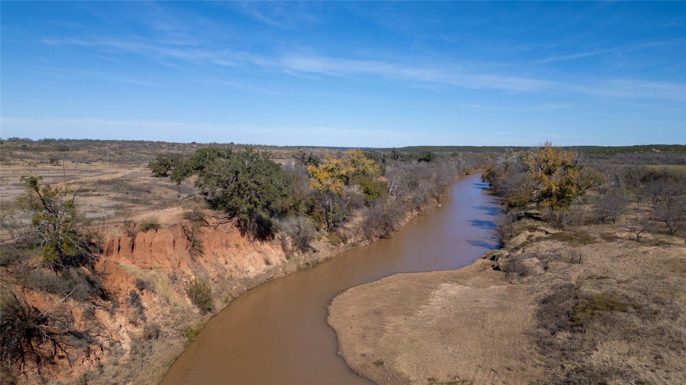 15 County Road 426 Road West Goldthwaite, TX 76844 - Photo 21 of 38 a view of a lake in middle of the forest
