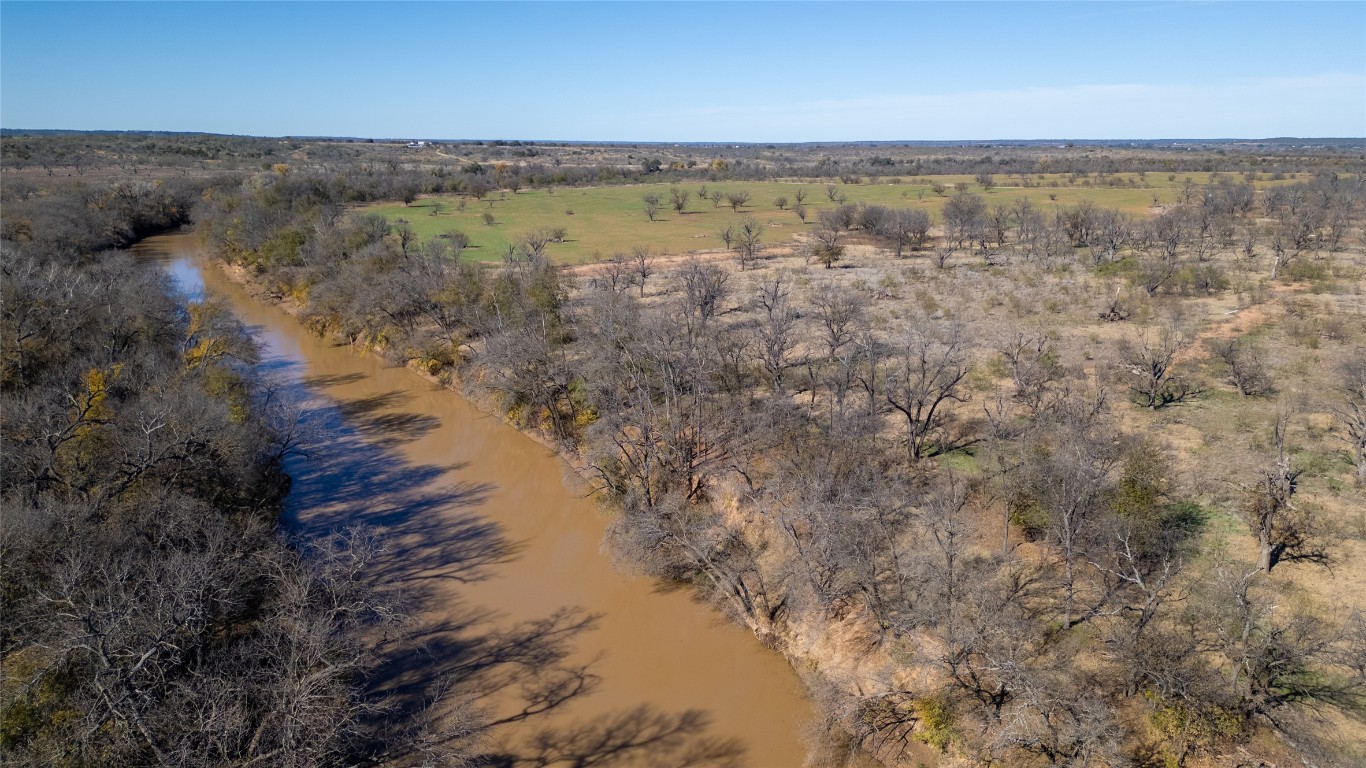 15 County Road 426 Road West Goldthwaite, TX 76844 - Photo 22 of 38 a view of a lake and mountain in the back