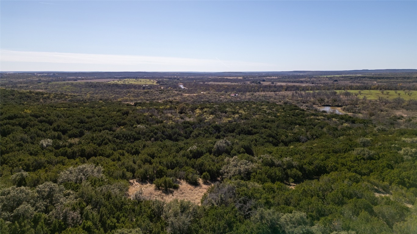 15 County Road 426 Road West Goldthwaite, TX 76844 - Photo 30 of 38 an aerial view of houses covered in trees