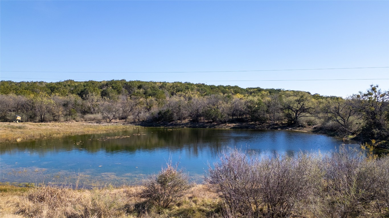15 County Road 426 Road West Goldthwaite, TX 76844 - Photo 3 of 38 a view of a lake with houses in the back