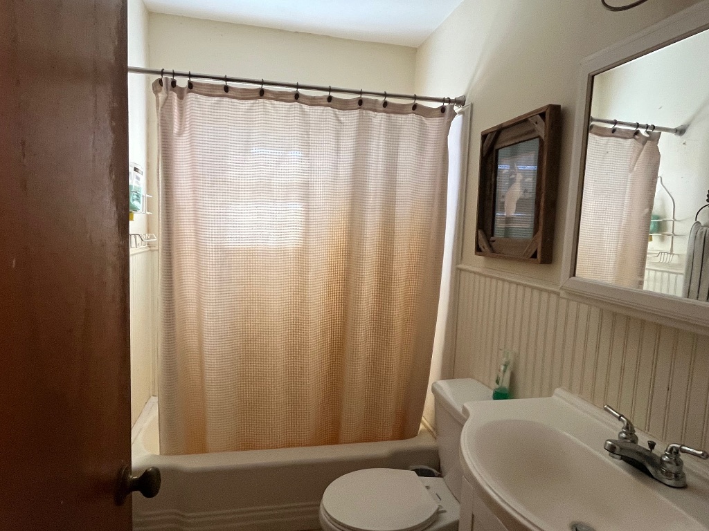 15 County Road 426 Road West Goldthwaite, TX 76844 - Photo 37 of 38 a bathroom with a sink toilet and shower