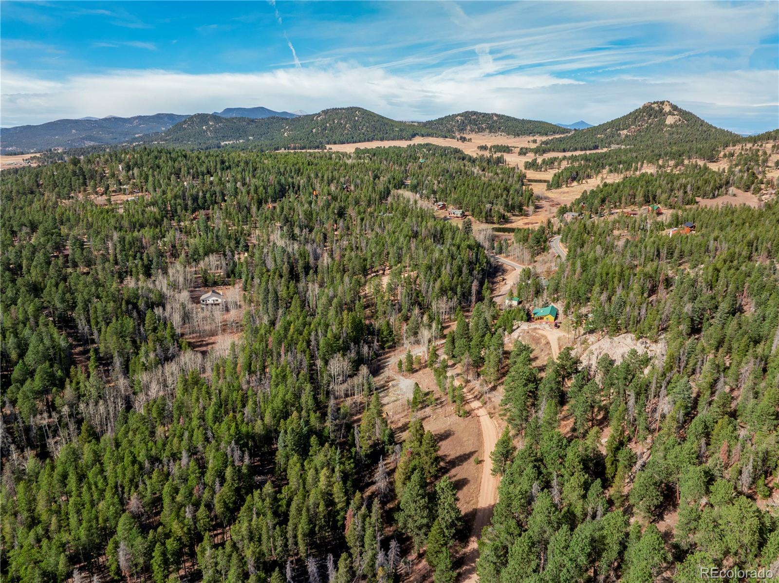 Lot 216620 Indian Springs Road Conifer, CO 80433 - Photo 12 of 42 a view of a city with a mountain