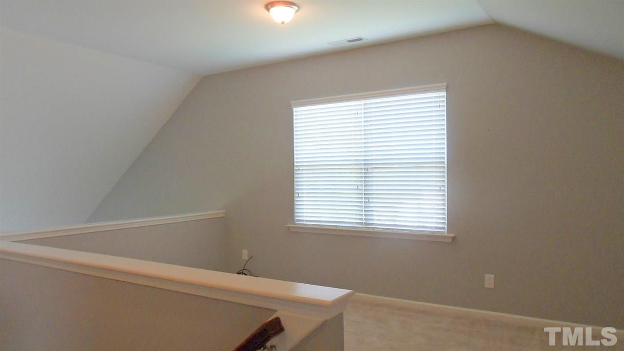 14324 Foxcroft Road Raleigh, NC 27614 - Photo 16 of 25 Sunny space...great for office or playroom. Overlooks living room.