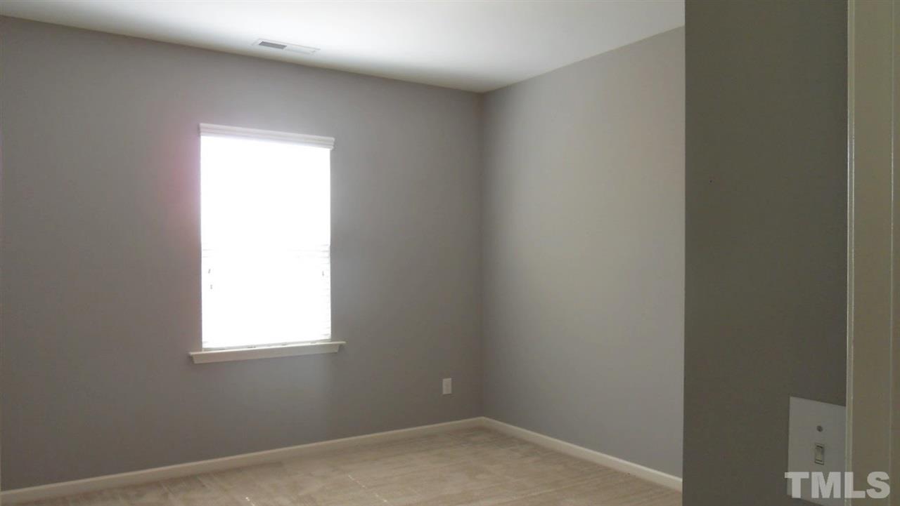 14324 Foxcroft Road Raleigh, NC 27614 - Photo 18 of 25 Bedroom 2 in front of home.