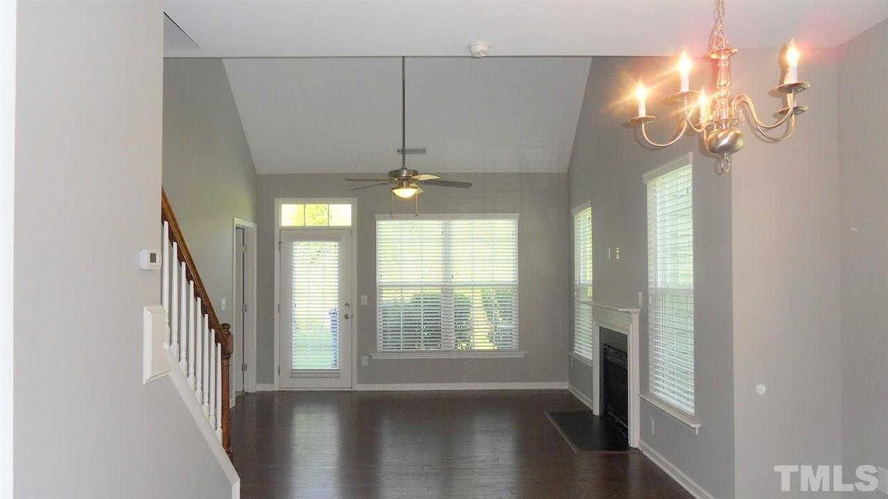 14324 Foxcroft Road Raleigh, NC 27614 - Photo 7 of 25 Wood floors in dining area and living room.
