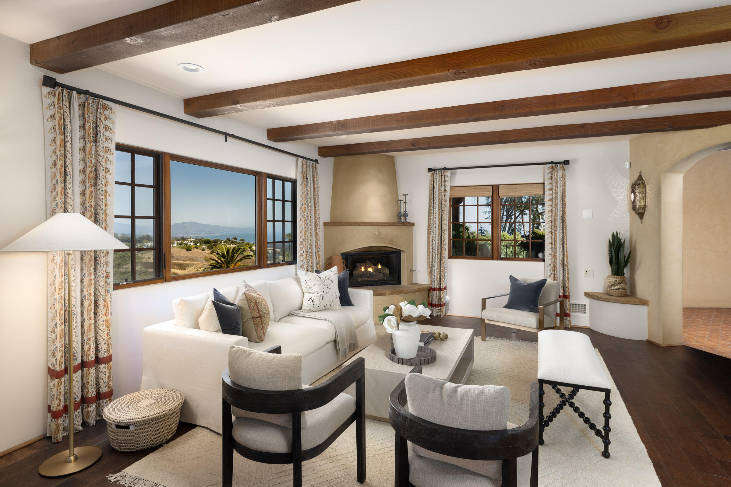 900 Las Alturas Road Santa Barbara, CA 93103 - Photo 11 of 42 a living room with furniture and a large mirror