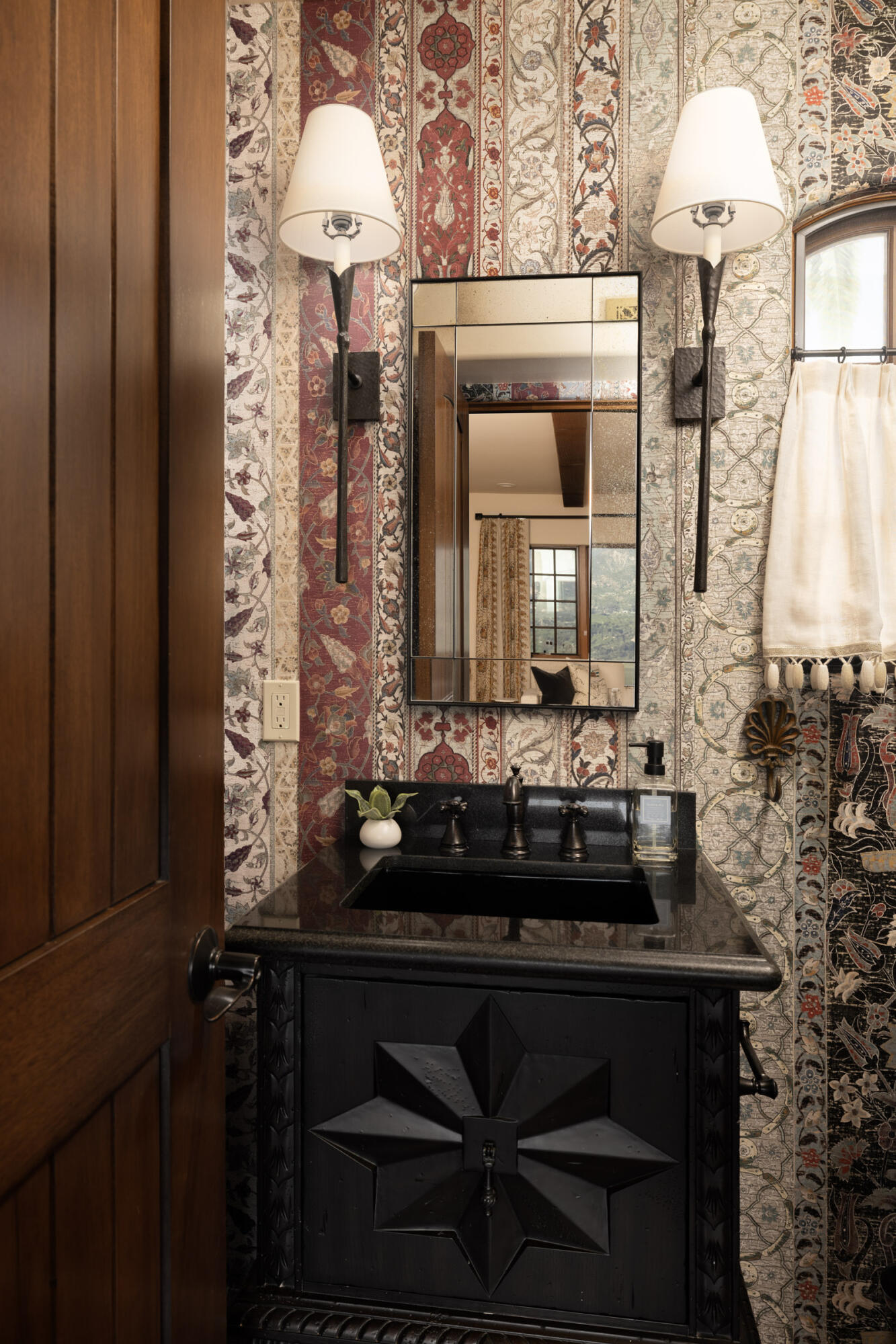 900 Las Alturas Road Santa Barbara, CA 93103 - Photo 13 of 42 a bathroom with a sink and a mirror