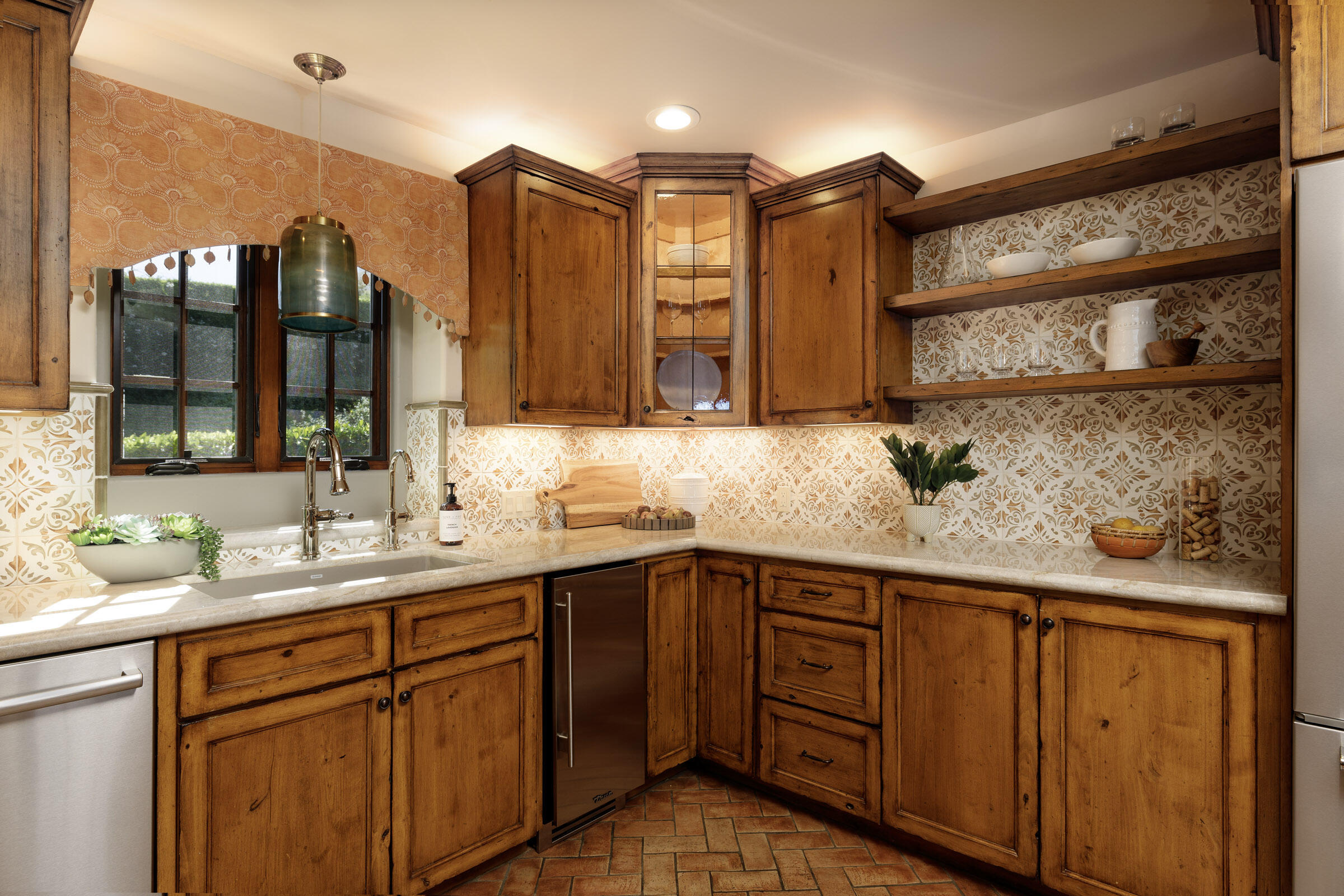 900 Las Alturas Road Santa Barbara, CA 93103 - Photo 18 of 42 a kitchen with a sink and cabinets
