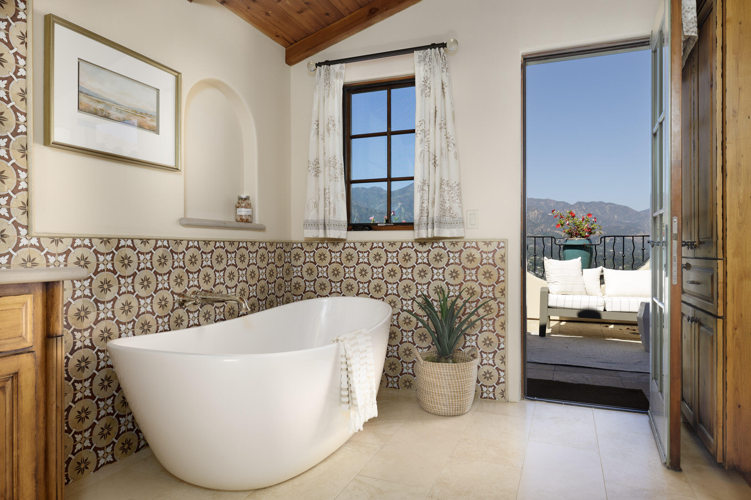 900 Las Alturas Road Santa Barbara, CA 93103 - Photo 24 of 42 a bathroom with a bathtub and a shower