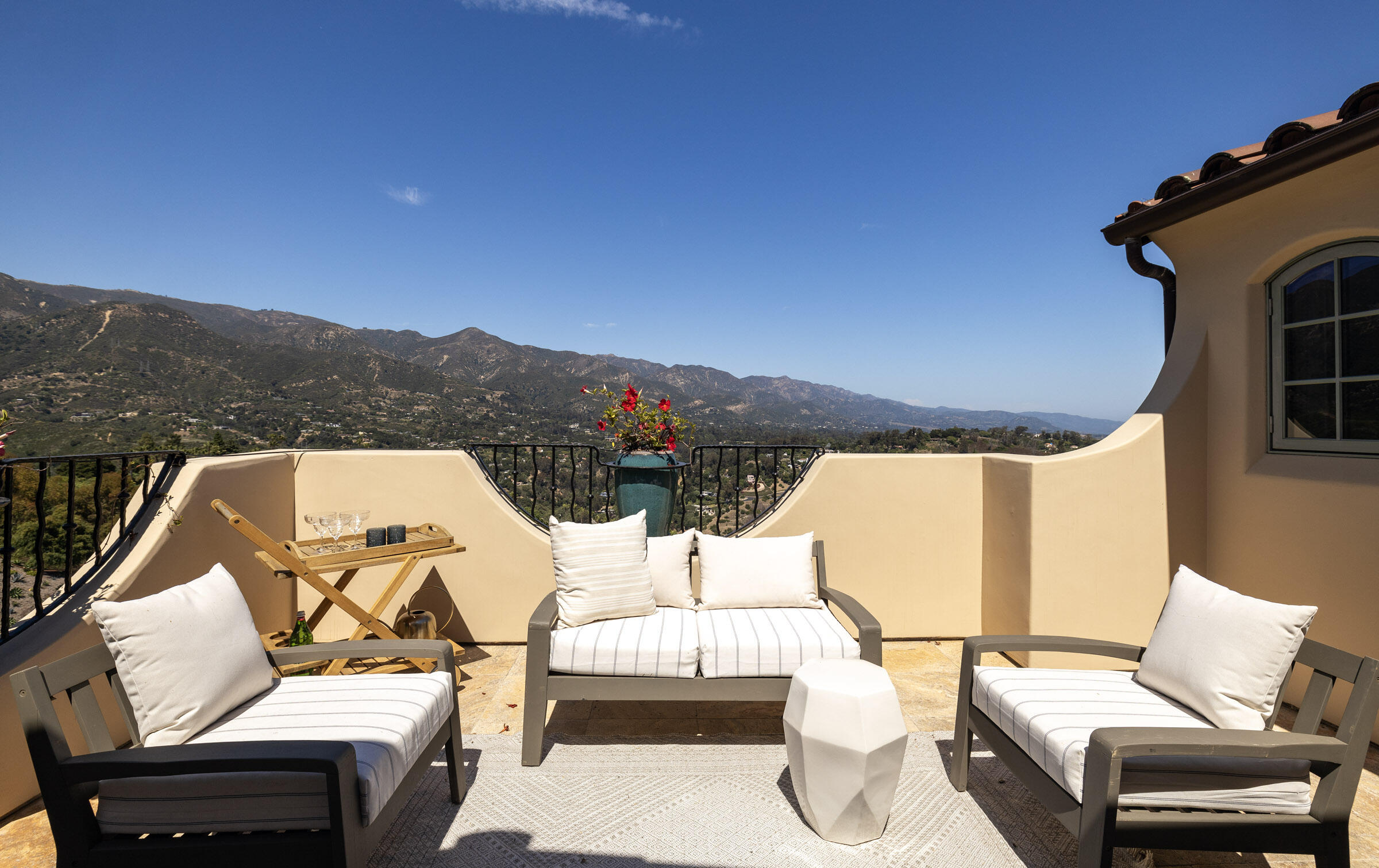900 Las Alturas Road Santa Barbara, CA 93103 - Photo 25 of 42 a view of a balcony with mountain view and wooden floor