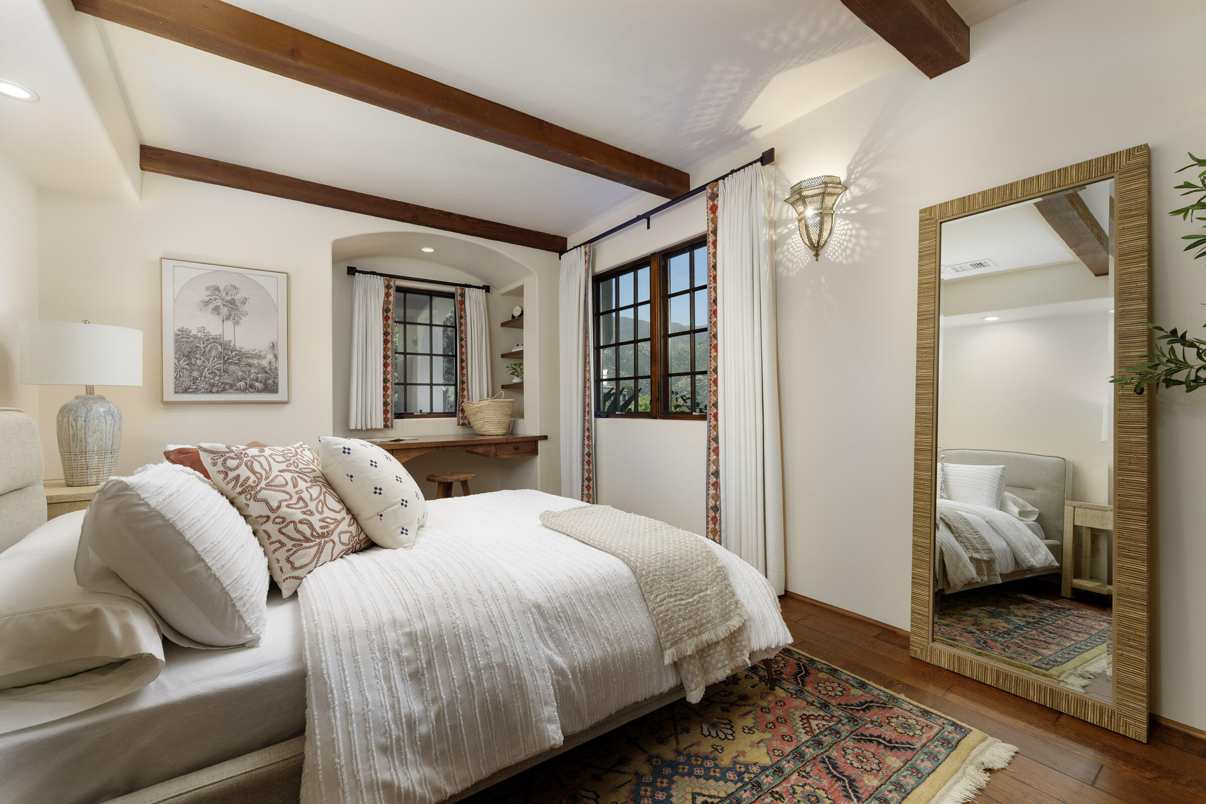 900 Las Alturas Road Santa Barbara, CA 93103 - Photo 28 of 42 a spacious bedroom with a bed and a window
