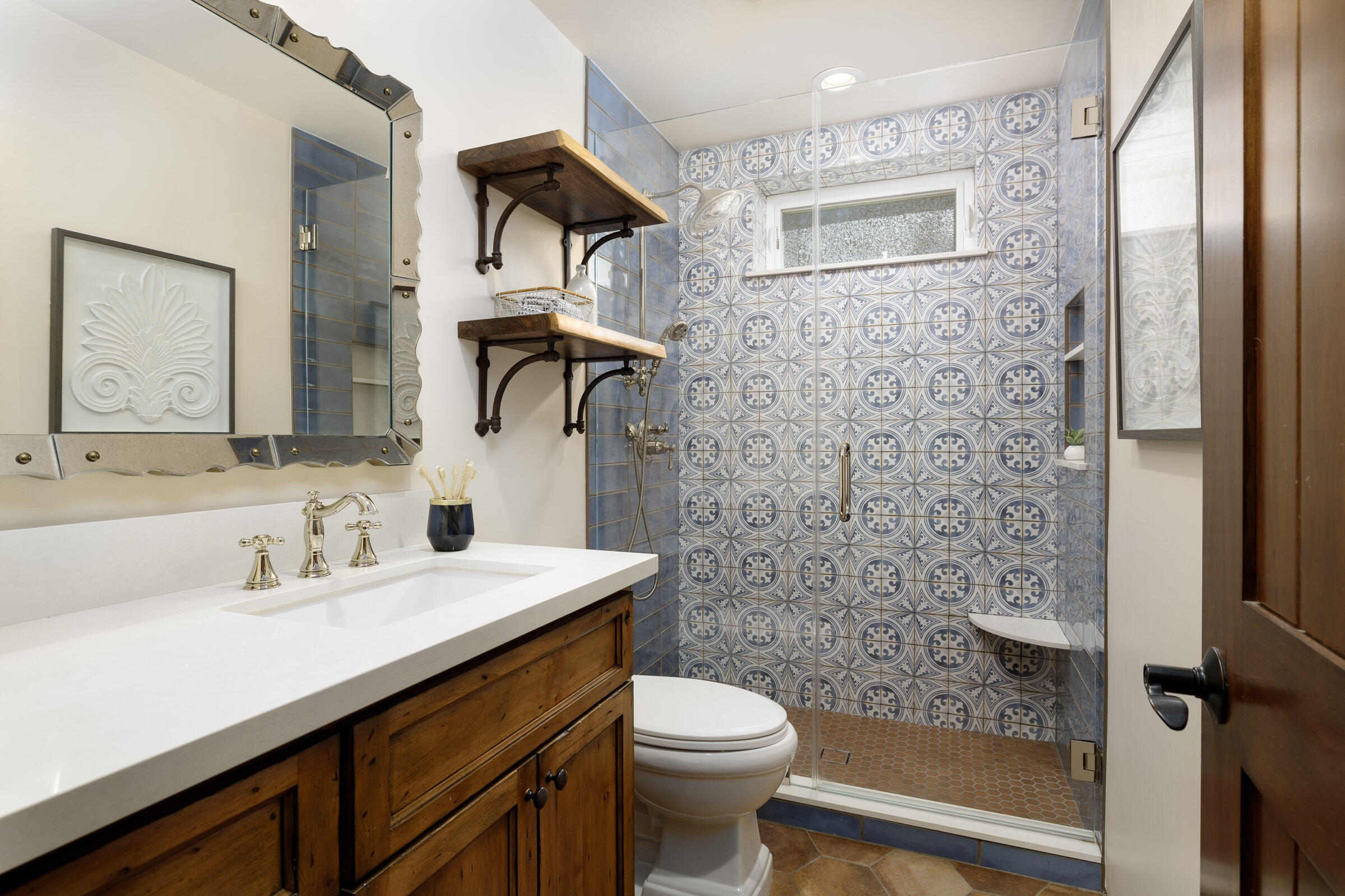 900 Las Alturas Road Santa Barbara, CA 93103 - Photo 29 of 42 a bathroom with a sink a toilet and shower