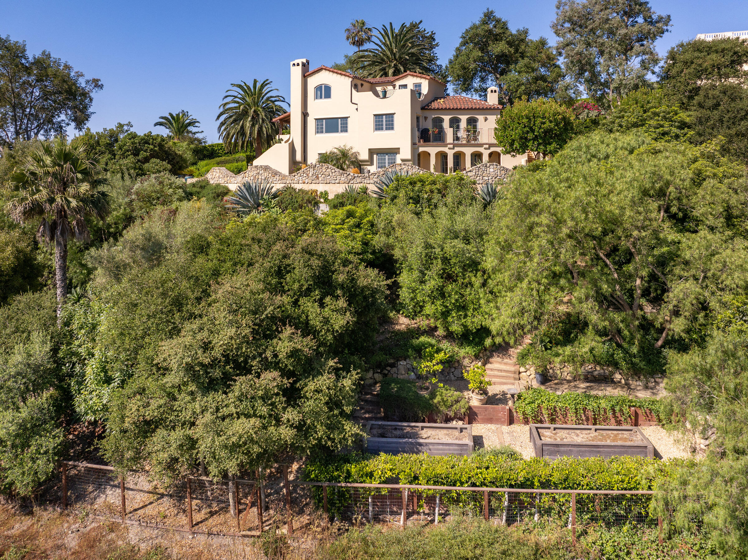 900 Las Alturas Road Santa Barbara, CA 93103 - Photo 37 of 42 front view of a house with a yard