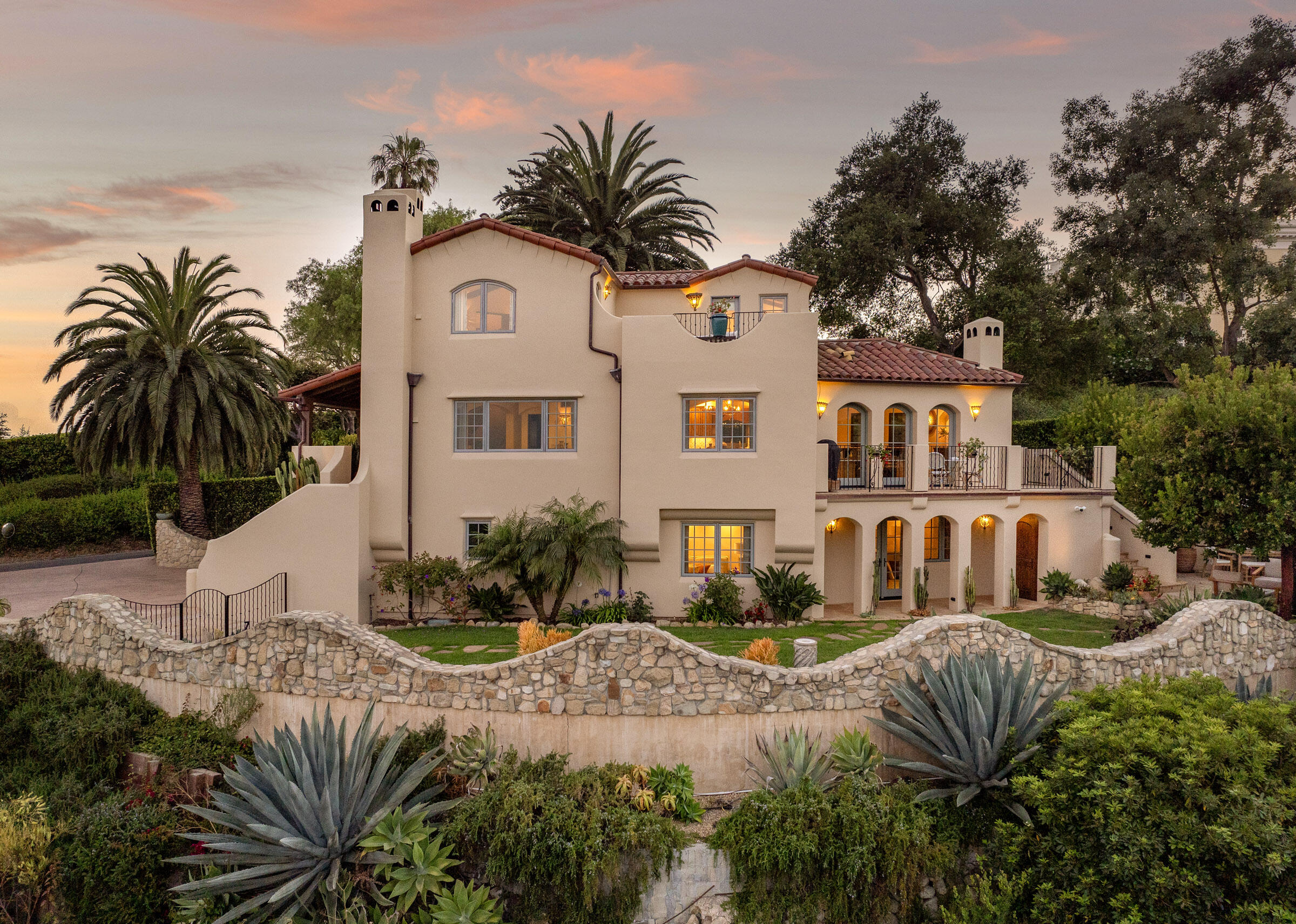 900 Las Alturas Road Santa Barbara, CA 93103 - Photo 41 of 42 a front view of a house with garden and porch