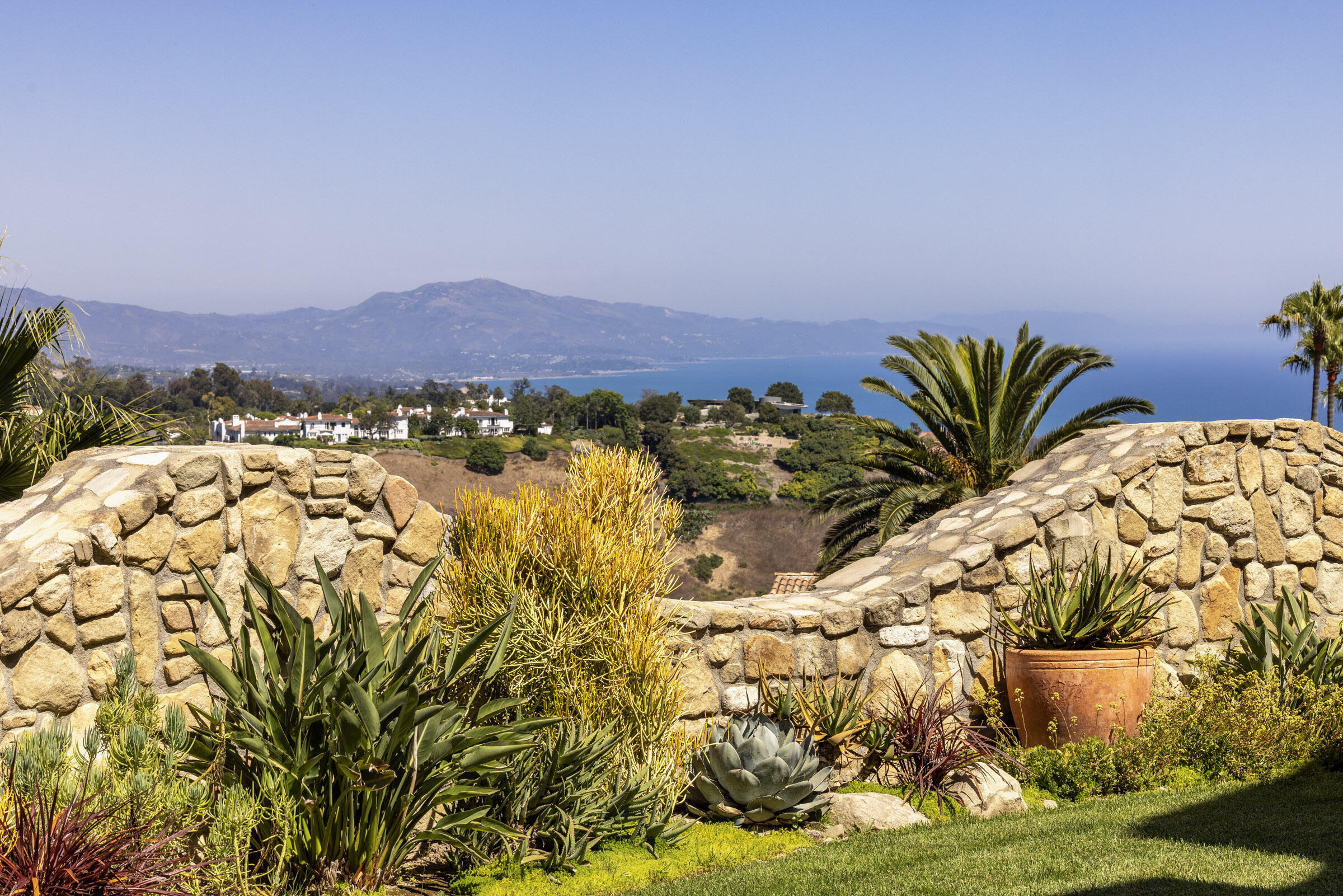 900 Las Alturas Road Santa Barbara, CA 93103 - Photo 7 of 42 a view of a lake with a mountain in the background