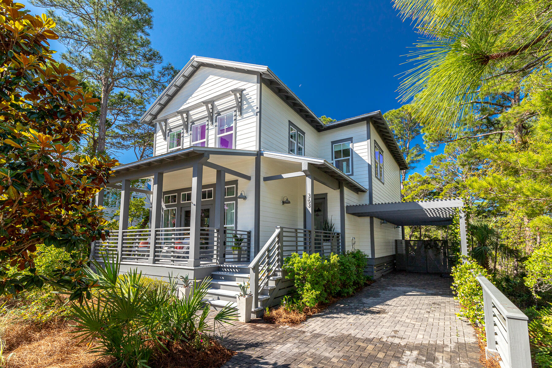 363 Matt's Way Santa Rosa Beach, FL 32459 - Photo 42 of 51 a front view of a house with garden