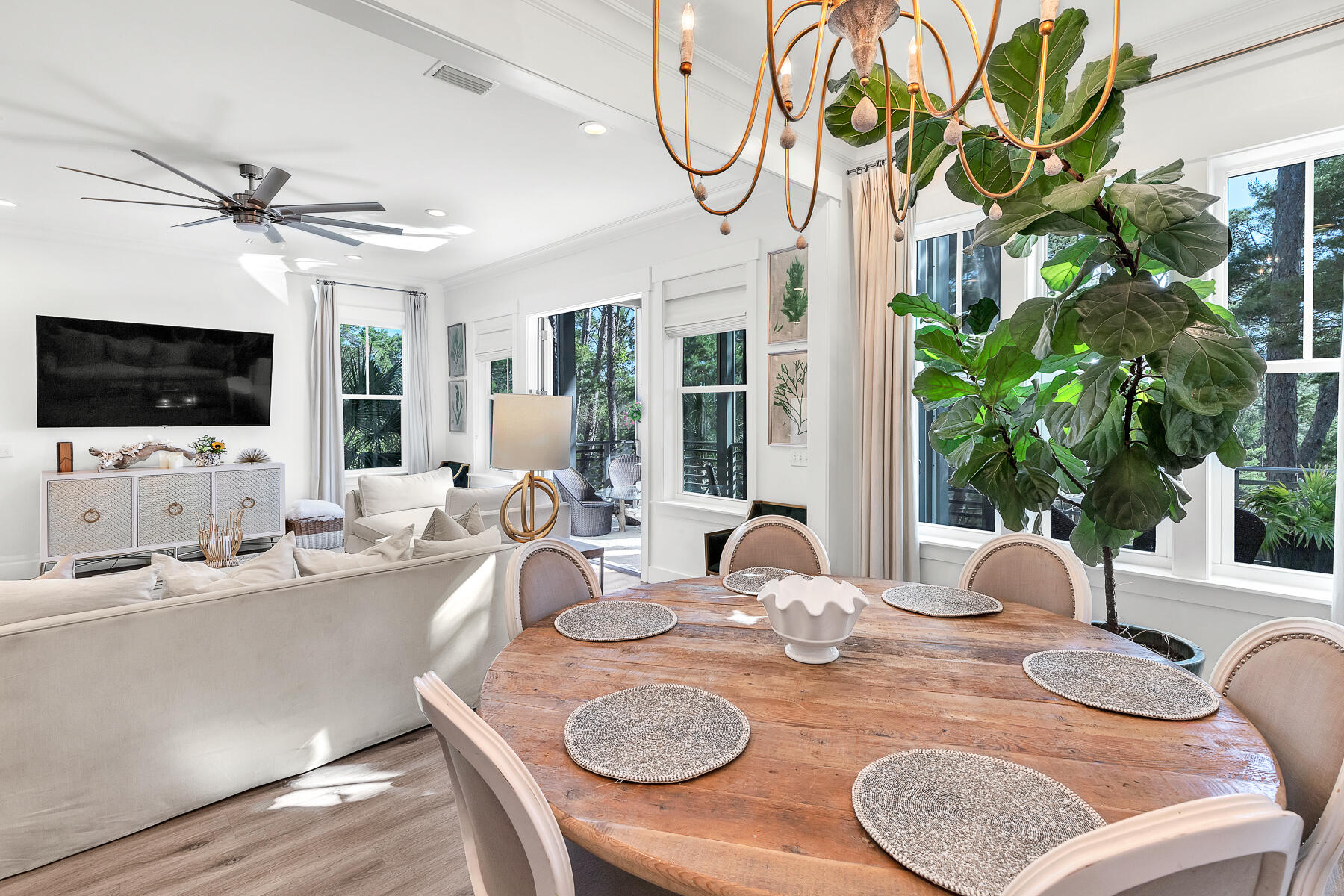 363 Matt's Way Santa Rosa Beach, FL 32459 - Photo 7 of 51 a living room with furniture a flat screen tv and a large window