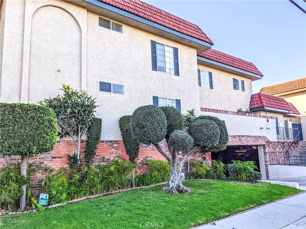 13535 Yukon Avenue, Unit 28 Hawthorne, CA 90250 - Photo 1 of 11 a front view of house with yard and green space