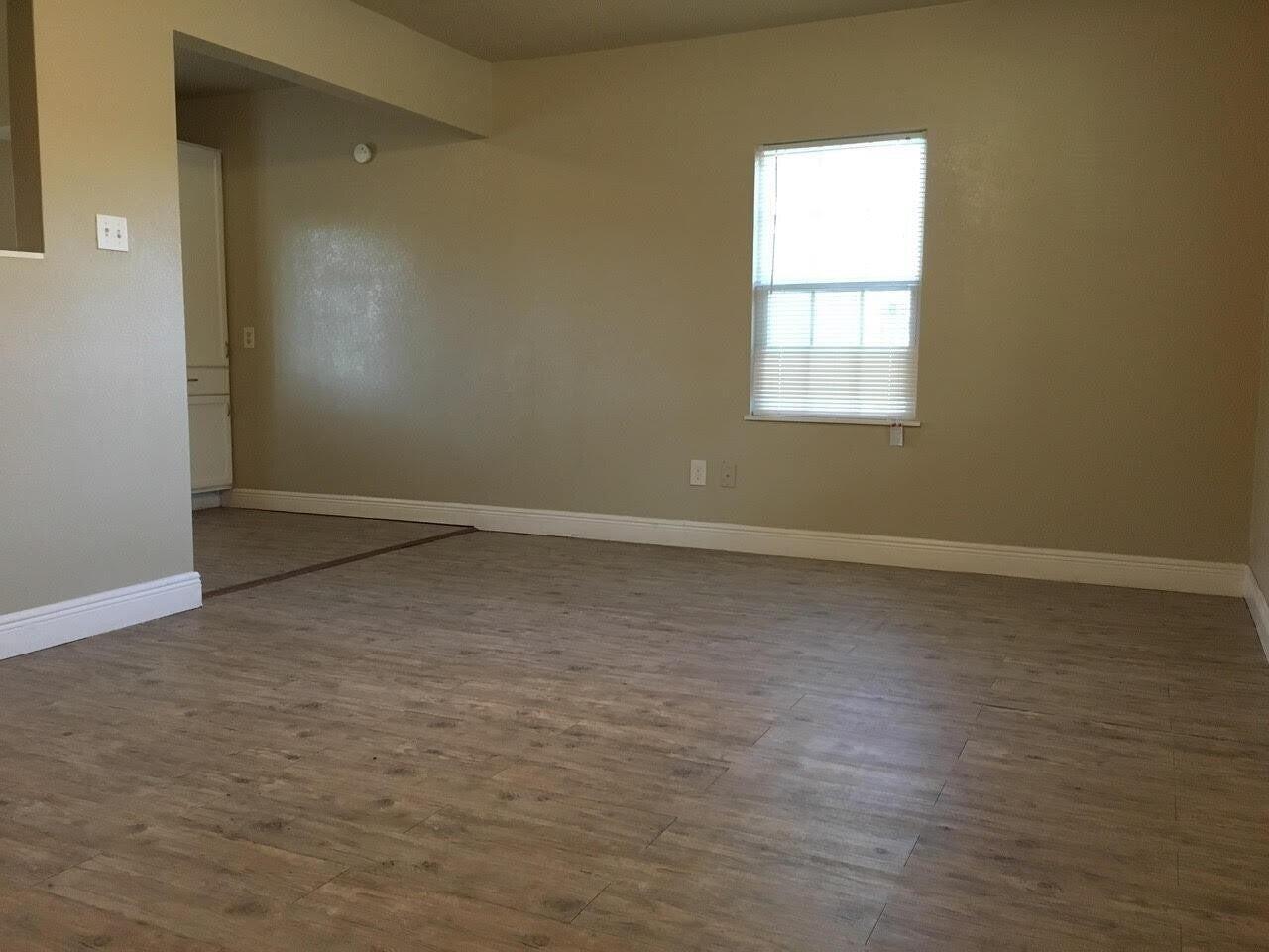 4501 45th Street Lubbock, TX 79414 - Photo 5 of 9 an empty room with a window