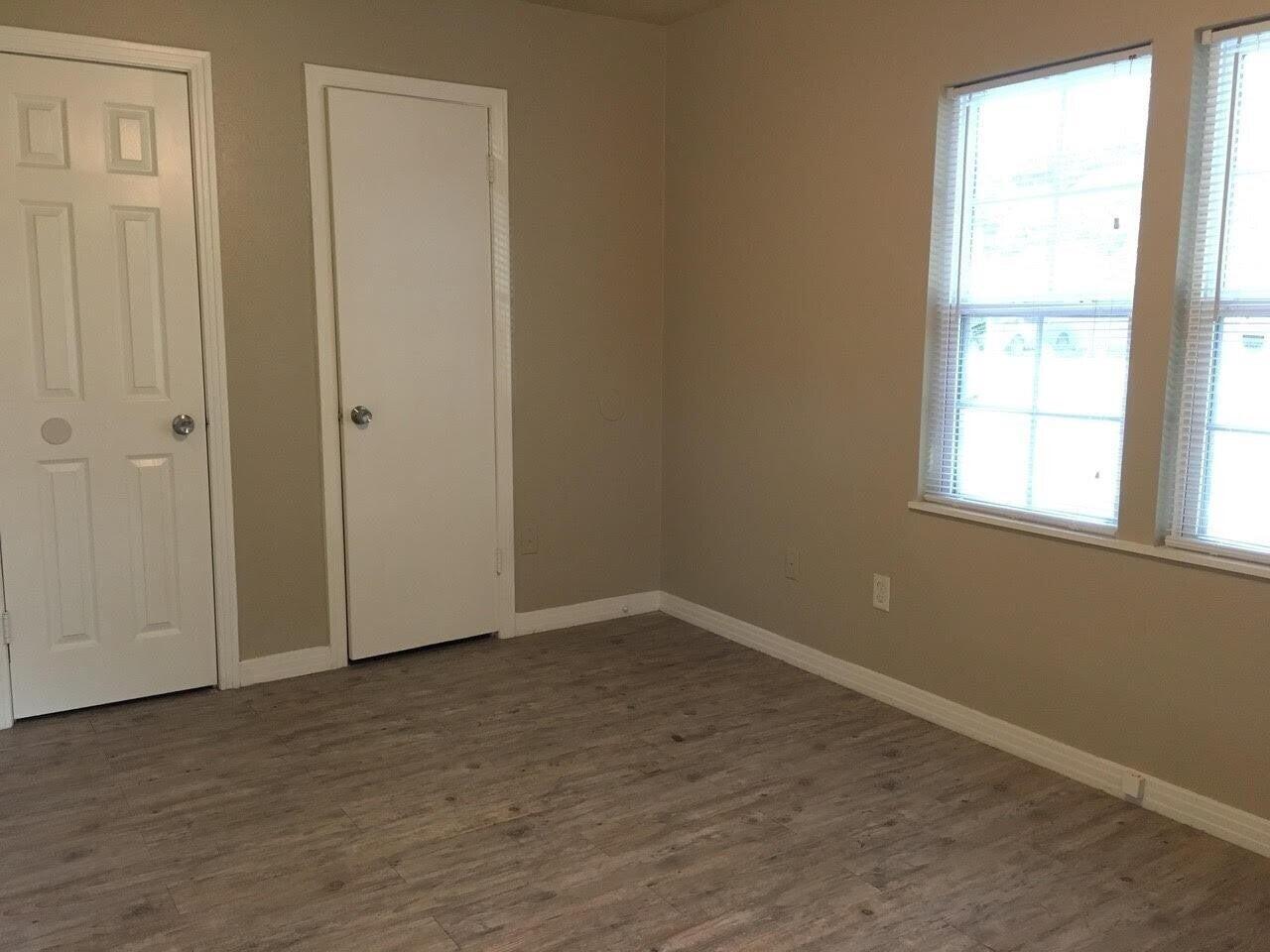 4501 45th Street Lubbock, TX 79414 - Photo 6 of 9 an empty room with windows