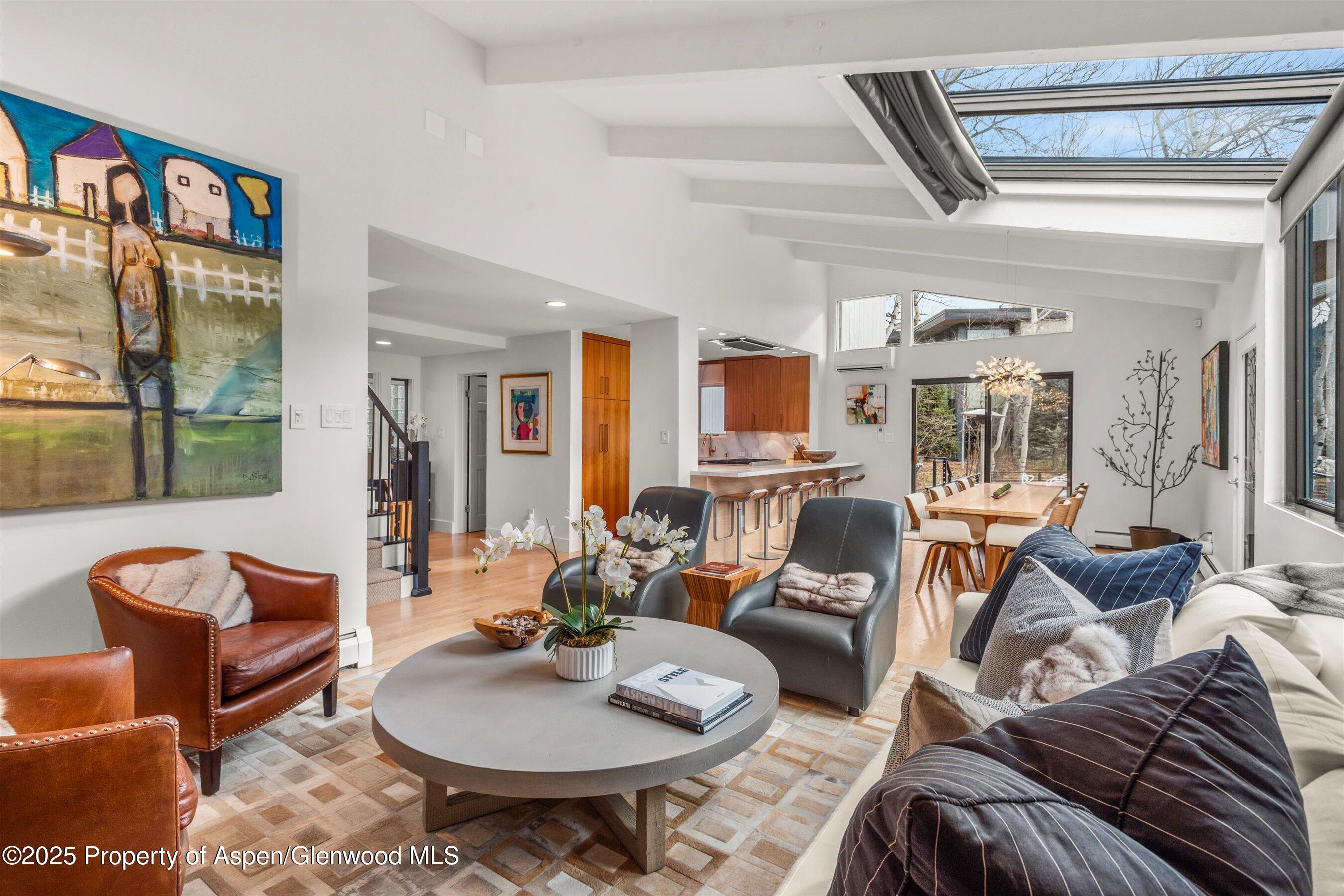 262 Eastwood Road Aspen, CO 81611 - Photo 11 of 46 a living room with furniture and a large window