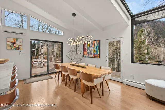 a bathroom with a glass door shower