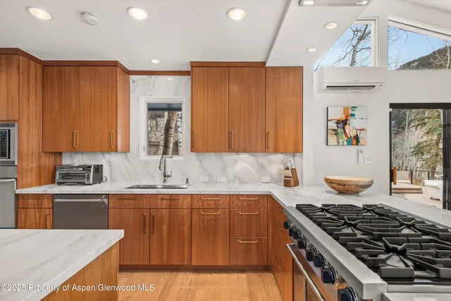 a bedroom with bed and a window