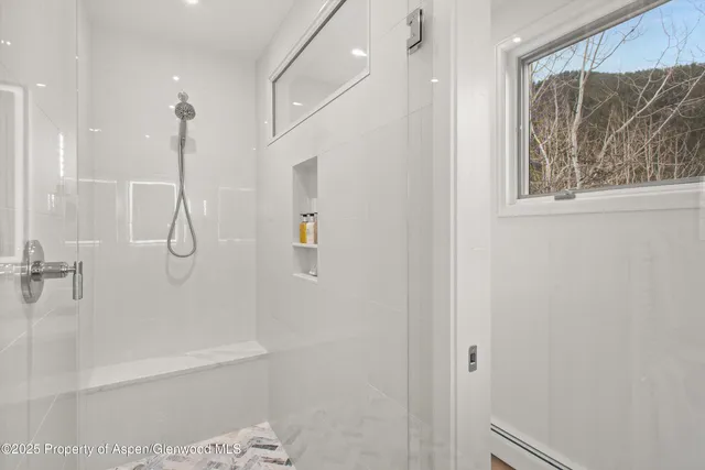 an outdoor space with furniture and windows