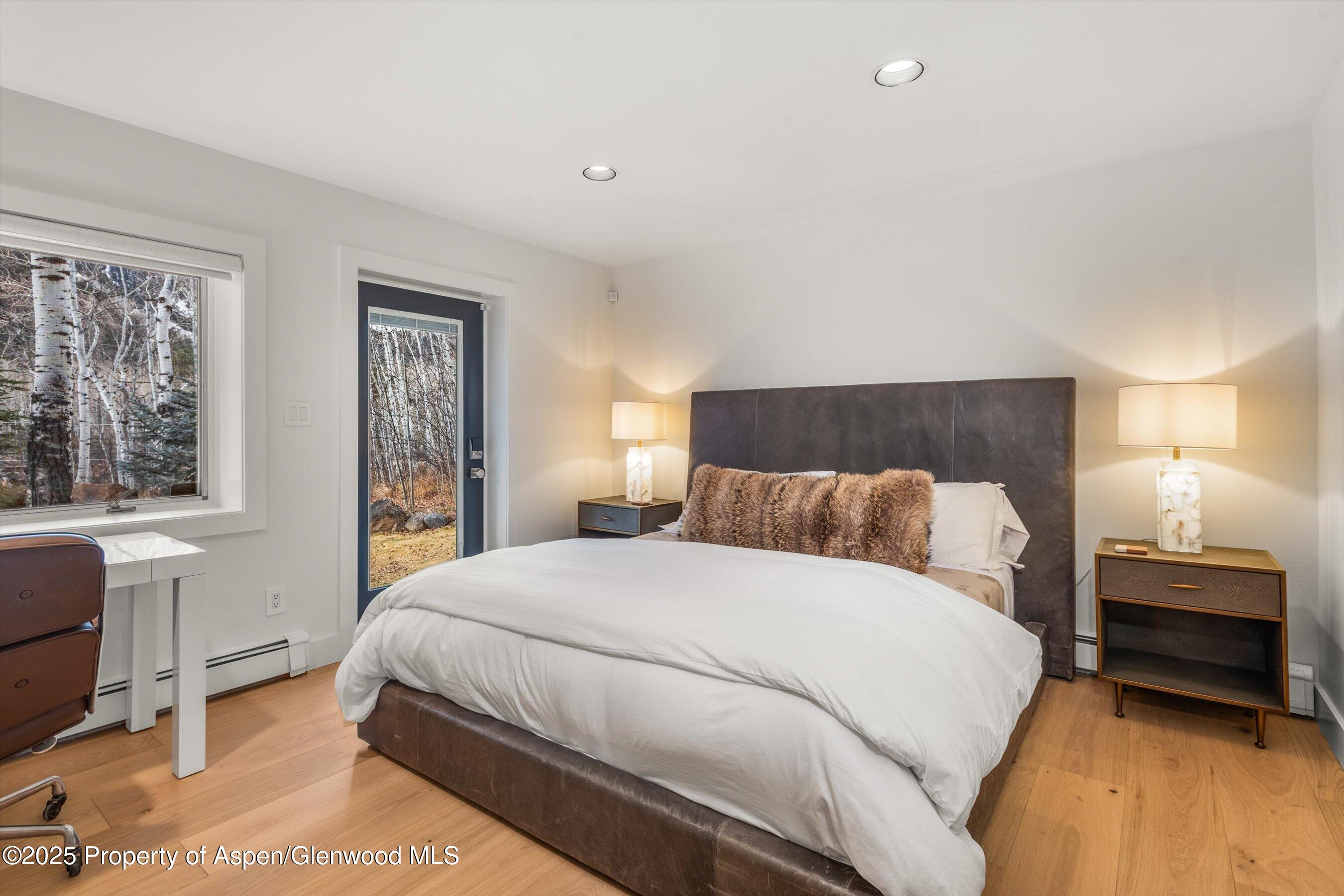 262 Eastwood Road Aspen, CO 81611 - Photo 34 of 46 a bedroom with a bed and a window