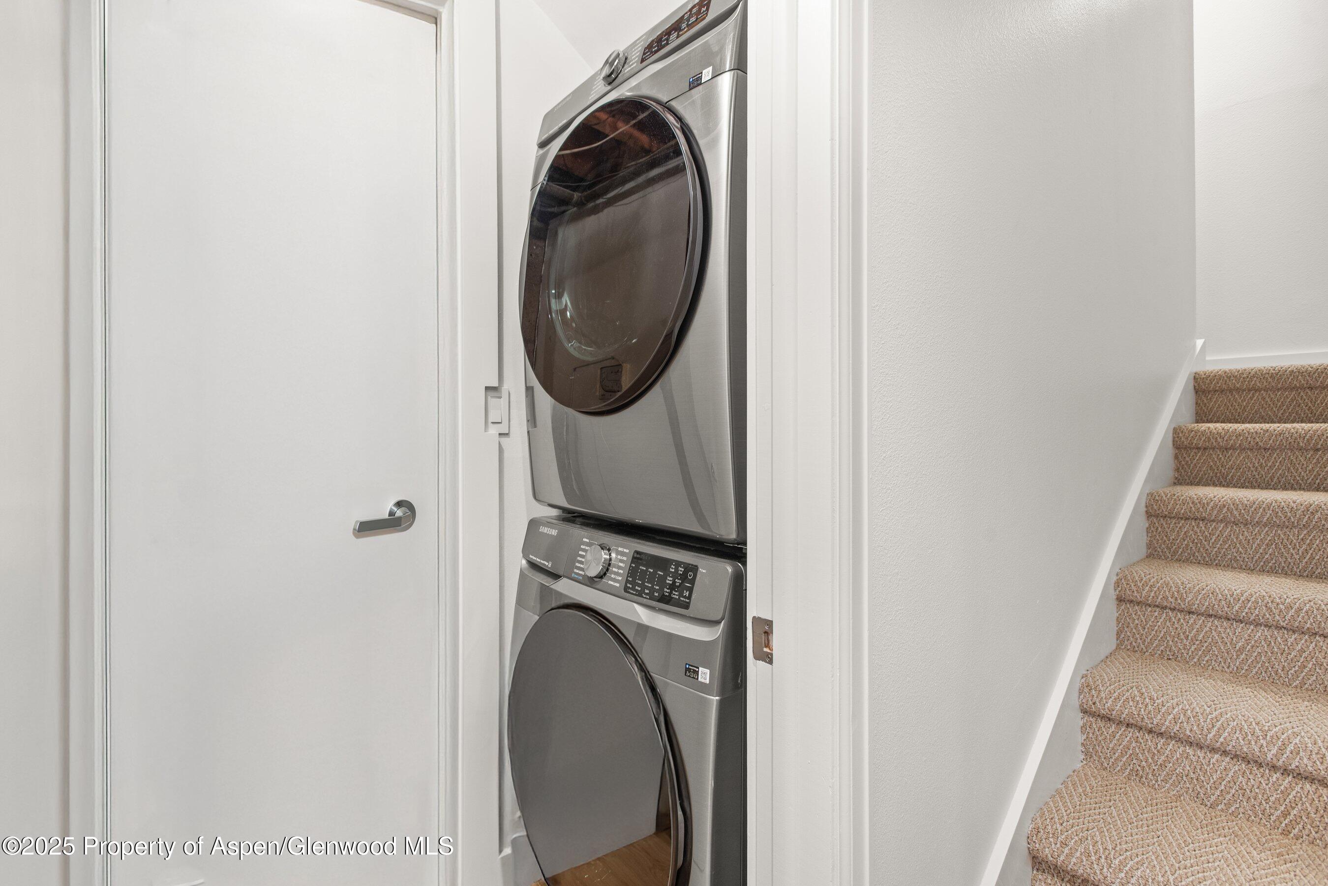 262 Eastwood Road Aspen, CO 81611 - Photo 39 of 46 a view of a hallway with washer and dryer