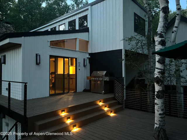 a view of dining room with furniture and entryway