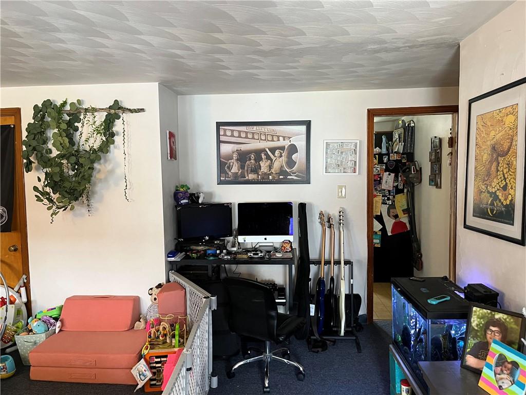 613-615 Bank Street Carnegie, PA 15106 - Photo 14 of 25 a view of a workspace with furniture and a window