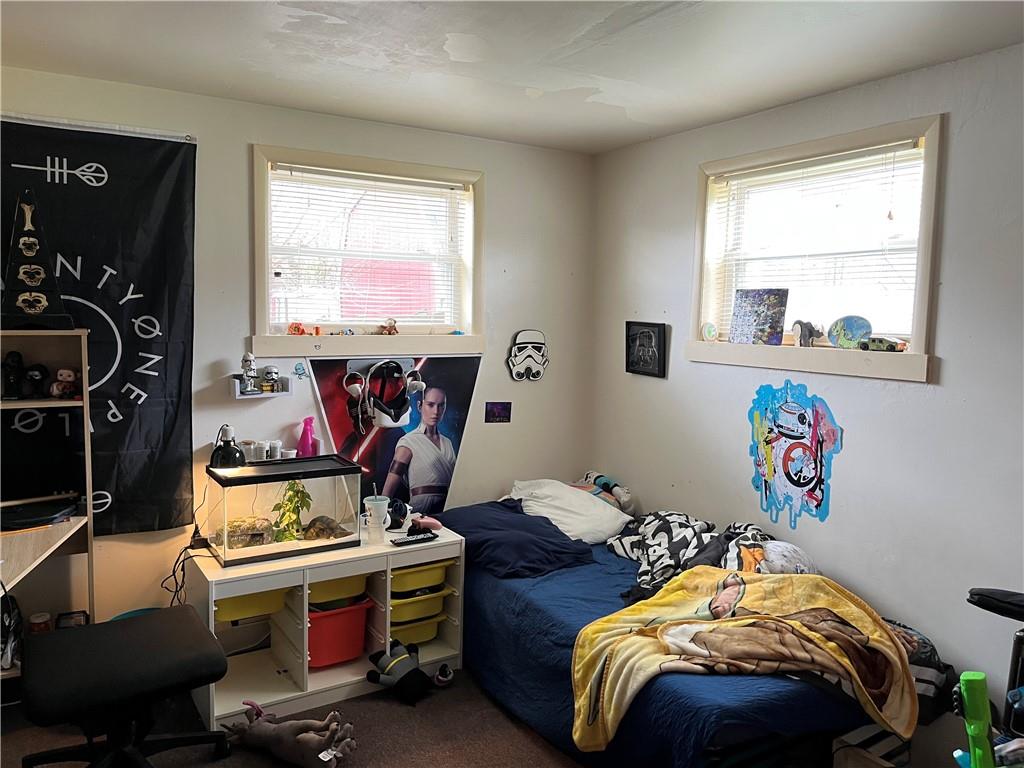 613-615 Bank Street Carnegie, PA 15106 - Photo 19 of 25 a bedroom with bed and a window