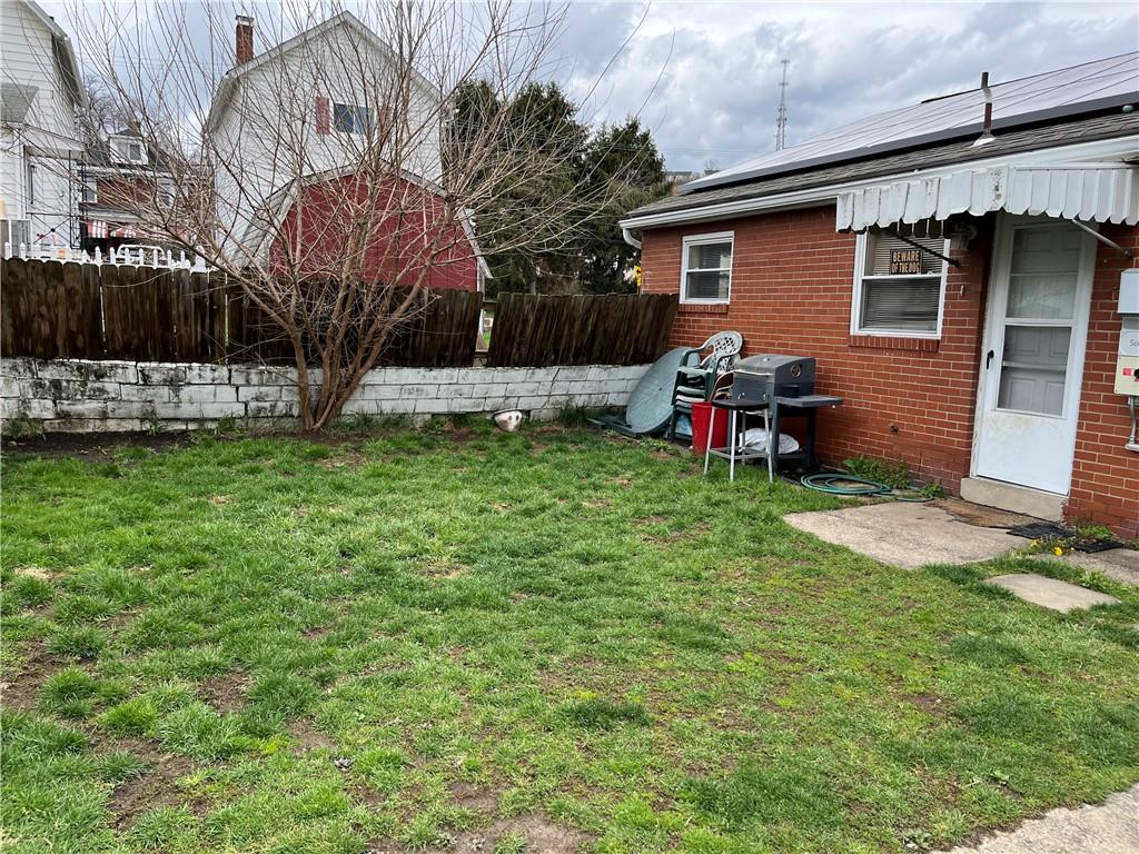 613-615 Bank Street Carnegie, PA 15106 - Photo 23 of 25 a view of a backyard with a garden