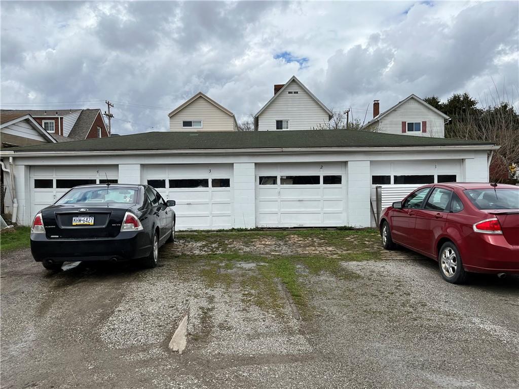 613-615 Bank Street Carnegie, PA 15106 - Photo 25 of 25 a car parked in front of a house