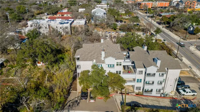a view of a balcony with furniture