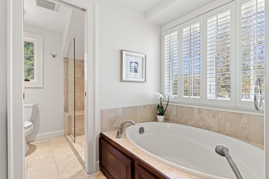 14 Winthrop Road Wayland, MA 01778 - Photo 14 of 25 a bathroom with a tub and shower