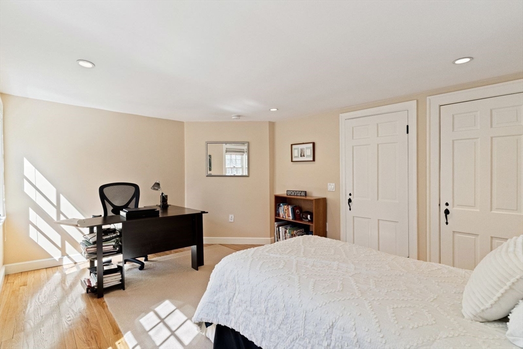 14 Winthrop Road Wayland, MA 01778 - Photo 18 of 25 a bedroom with a bed and a dresser