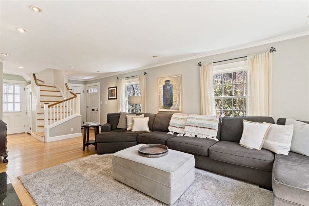 14 Winthrop Road Wayland, MA 01778 - Photo 7 of 25 a living room with furniture and a large window