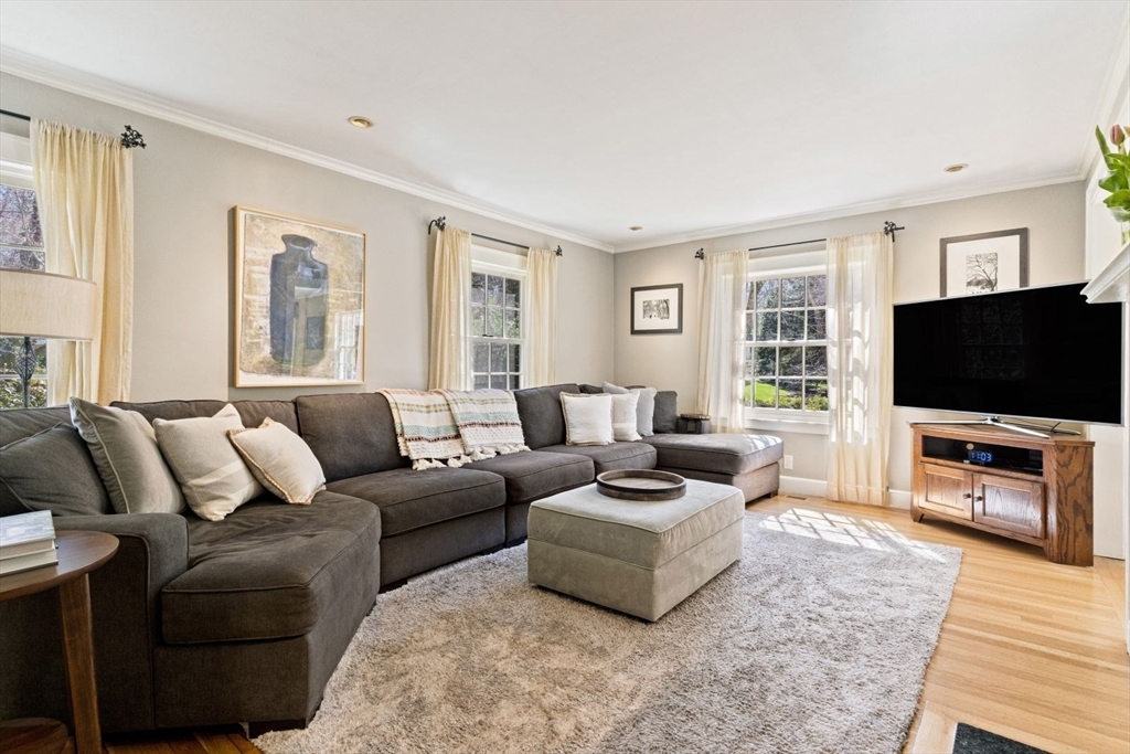 14 Winthrop Road Wayland, MA 01778 - Photo 8 of 25 a living room with furniture and a flat screen tv