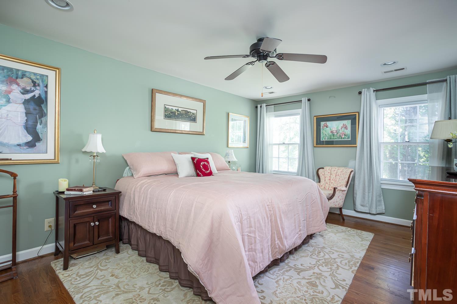 3001 Old Orchard Road Raleigh, NC 27607 - Photo 9 of 12 a bedroom with a large bed and a window