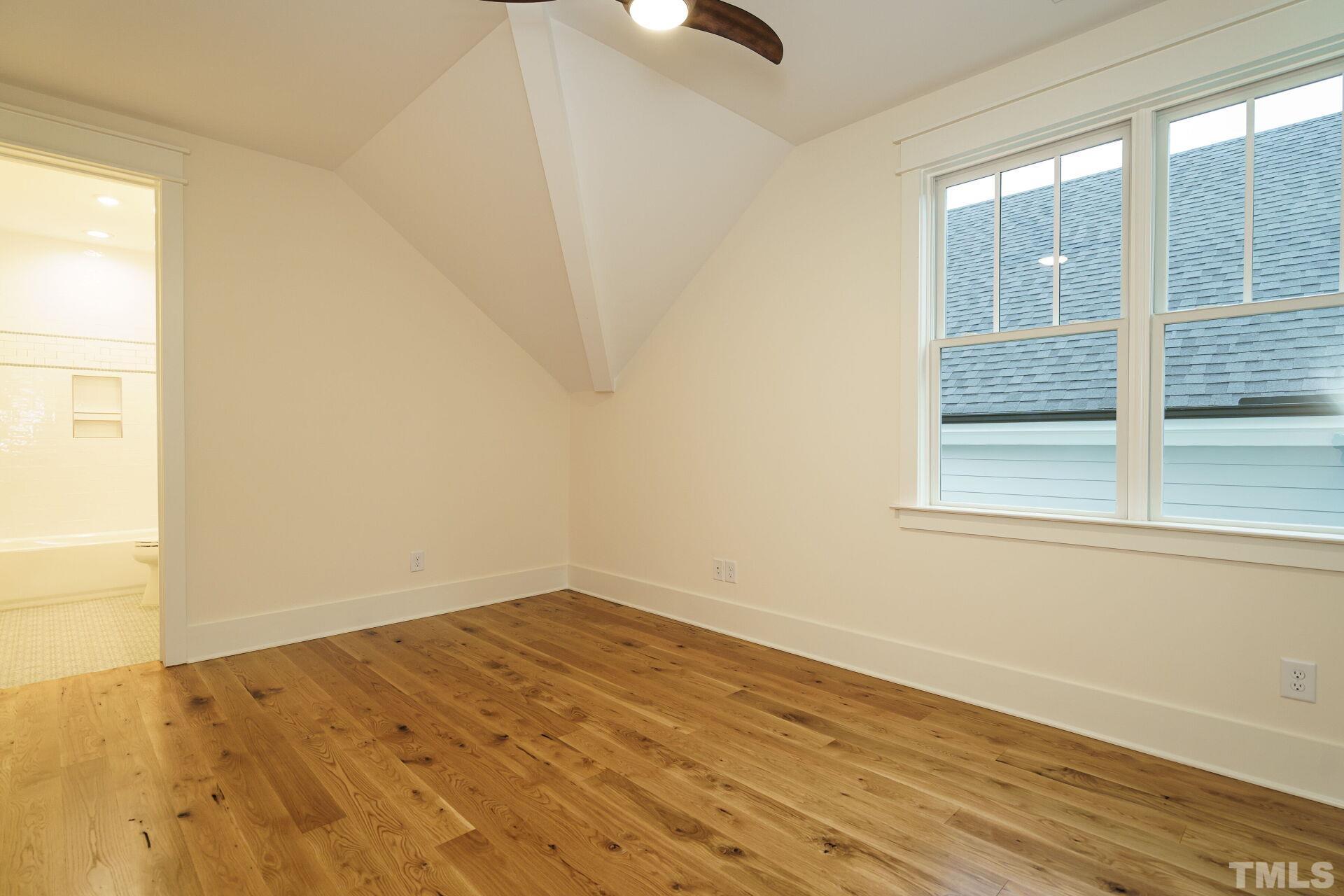 505 Harvey Street Raleigh, NC 27608 - Photo 24 of 31 an empty room with a window