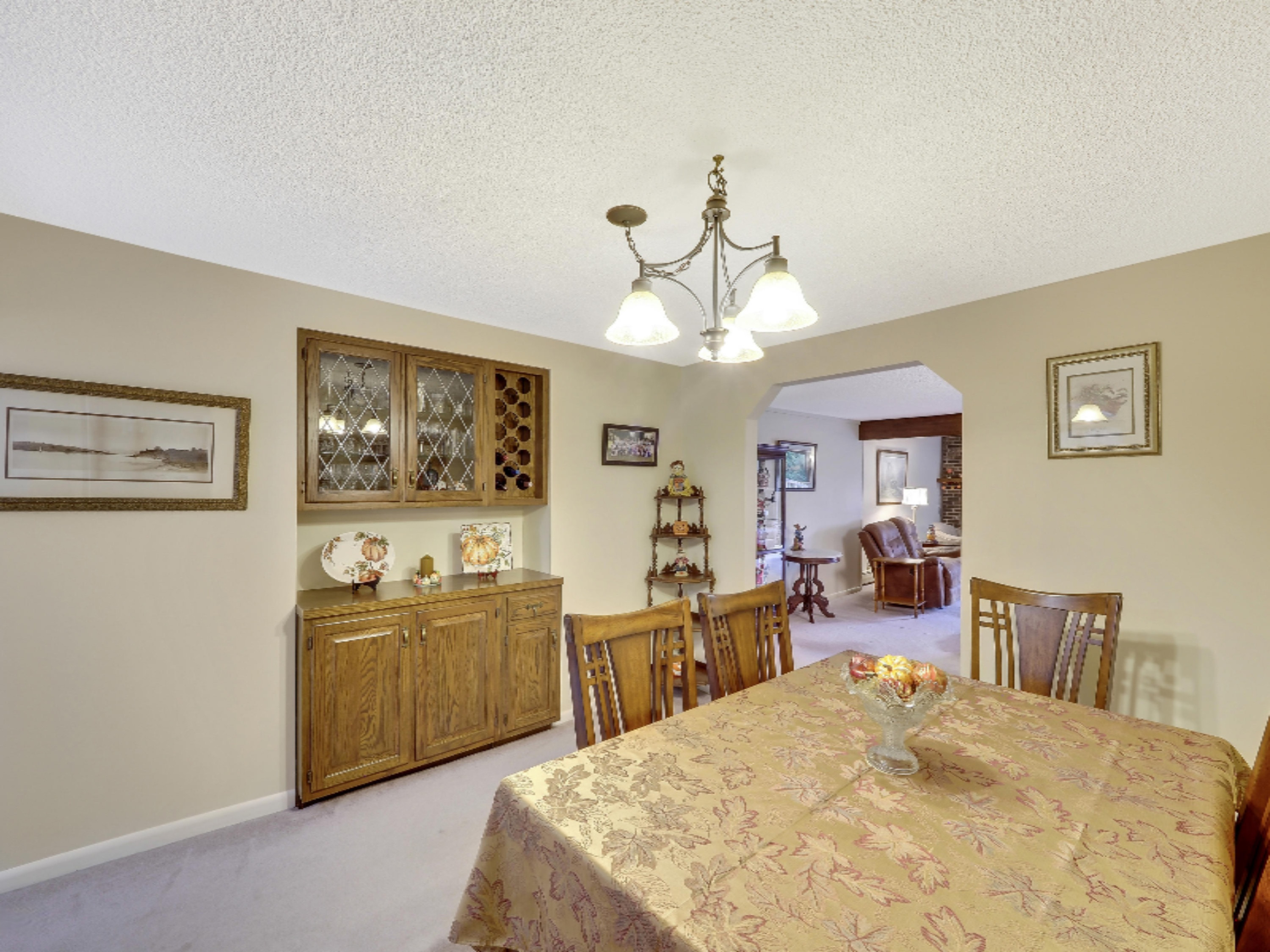 7123 Adamson Lake Road Kaleva, MI 49645 - Photo 13 of 59 Dining Room with Built-in Wine Rack
