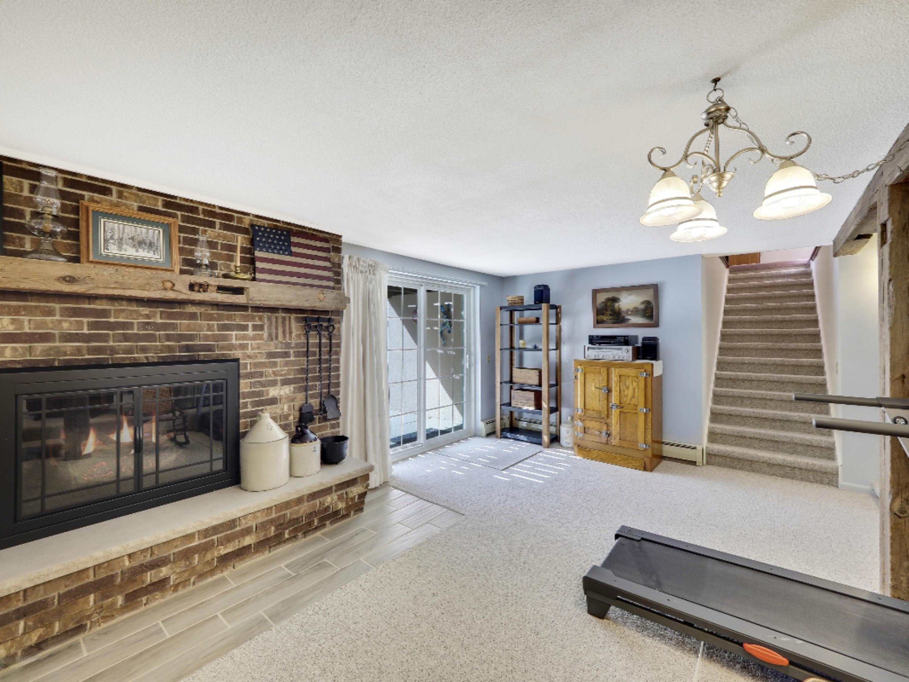 7123 Adamson Lake Road Kaleva, MI 49645 - Photo 26 of 59 Lower Level Wood-Burning Fire Place